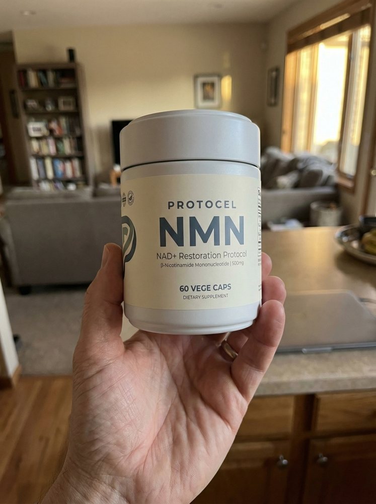 Customer holding a PROTOCEL NMN jar